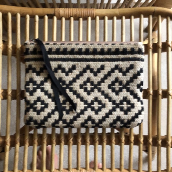 Mango clutch. Textured geometric pattern. Zip top w/ black grosgrain ribbon pull - Picture 2 of 11